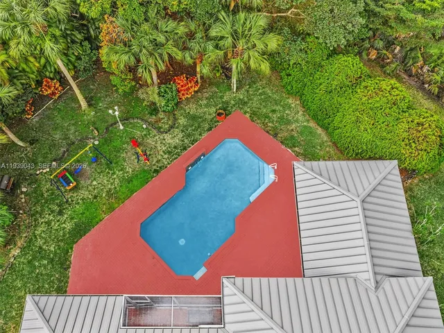 $940,000 | 8720 Northwest 18th Street, Coral Springs, FL 33071