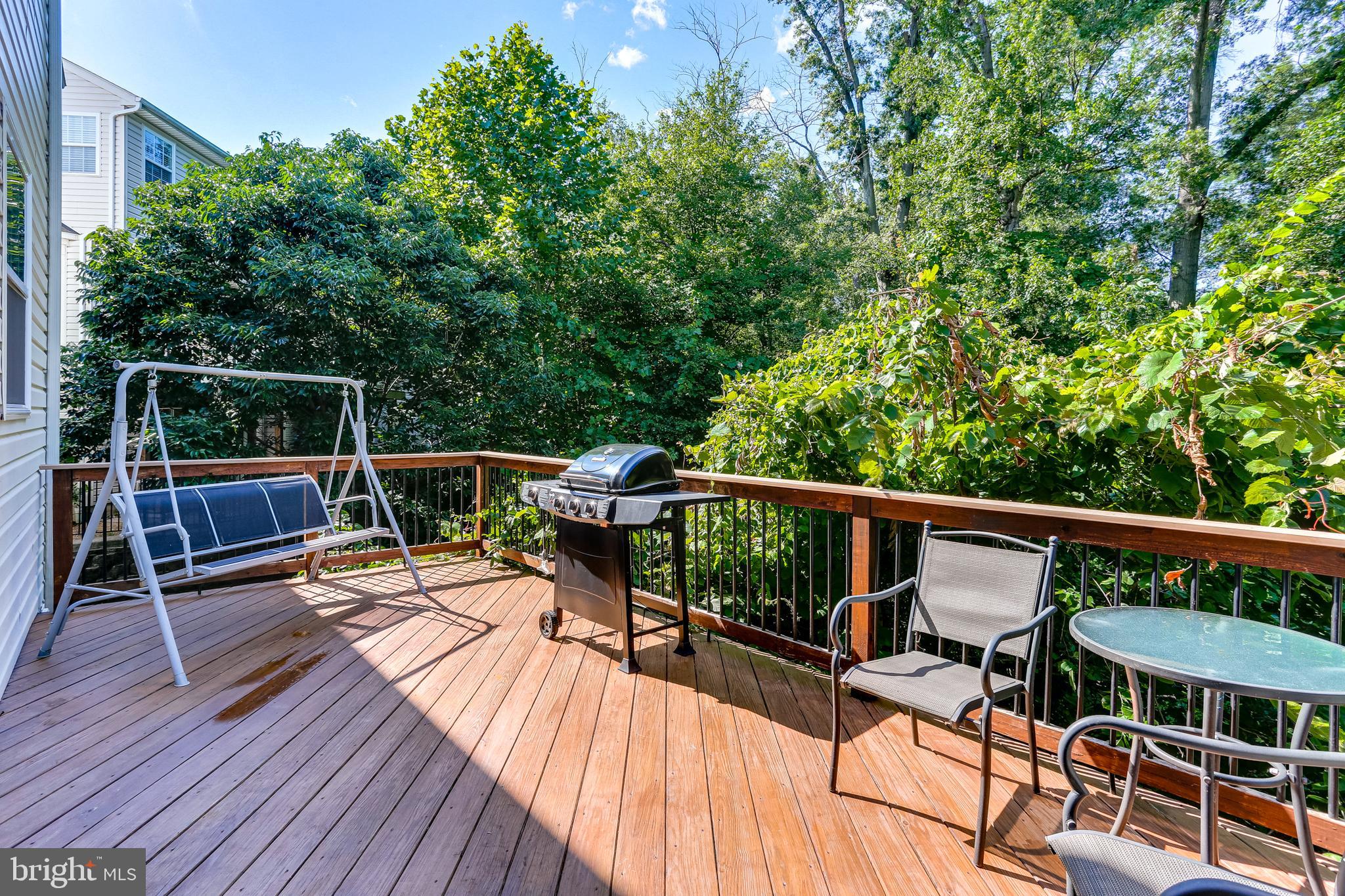 7128 Water Oak Road, Unit 244 Elkridge, MD 21075 - Photo 15 of 31 and enjoying nature and the serene wooded view.