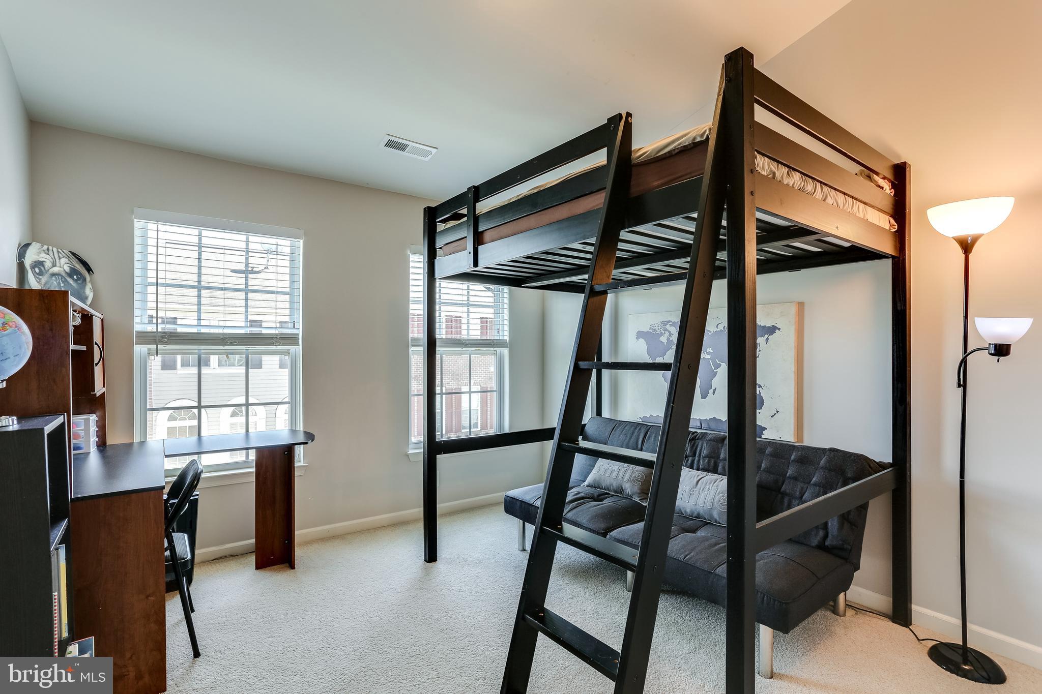 7128 Water Oak Road, Unit 244 Elkridge, MD 21075 - Photo 20 of 31 Bedroom 2 has big windows & upgraded custom blinds