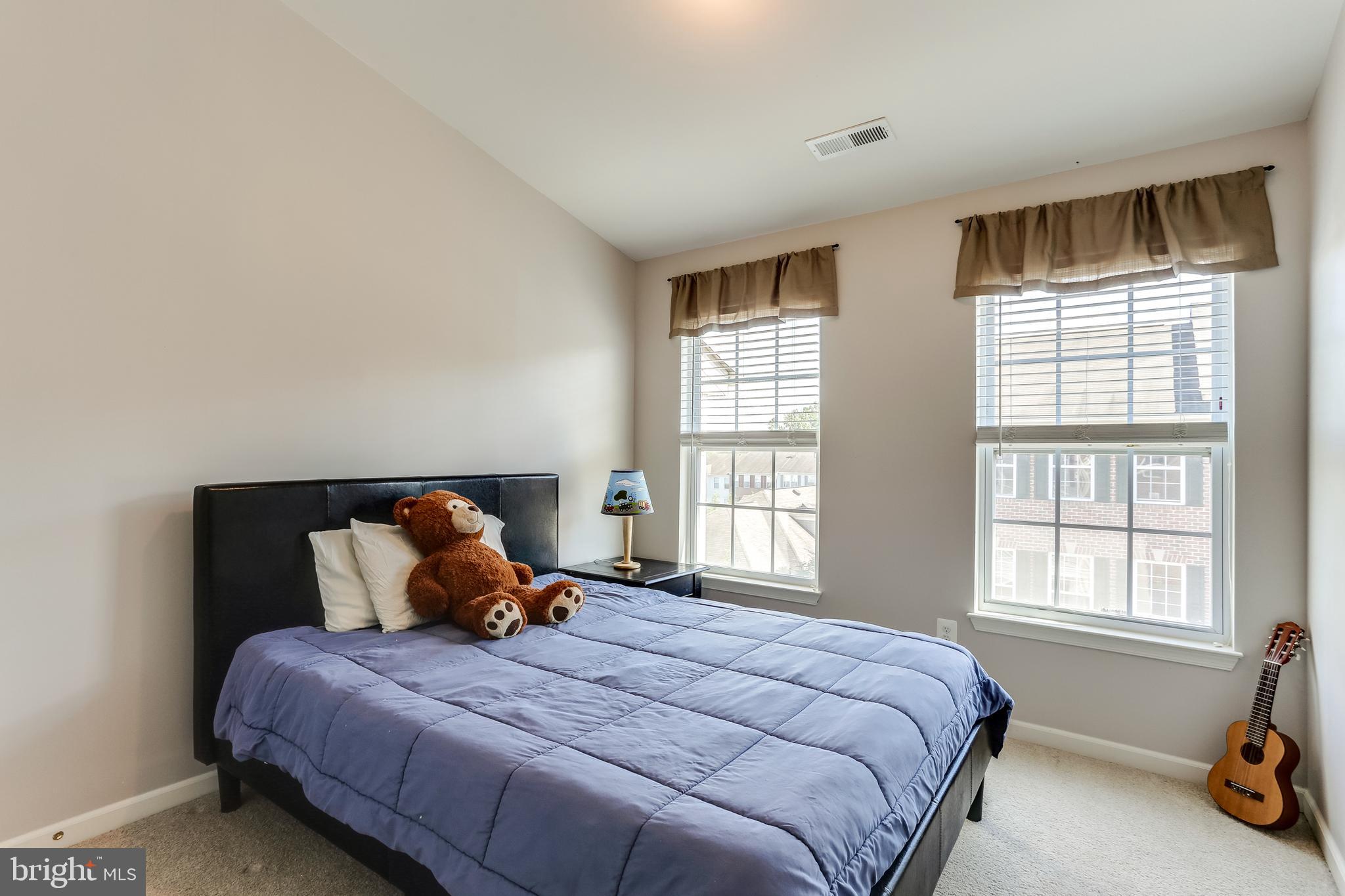 7128 Water Oak Road, Unit 244 Elkridge, MD 21075 - Photo 22 of 31 Bedroom 3 has big windows & upgraded custom blinds
