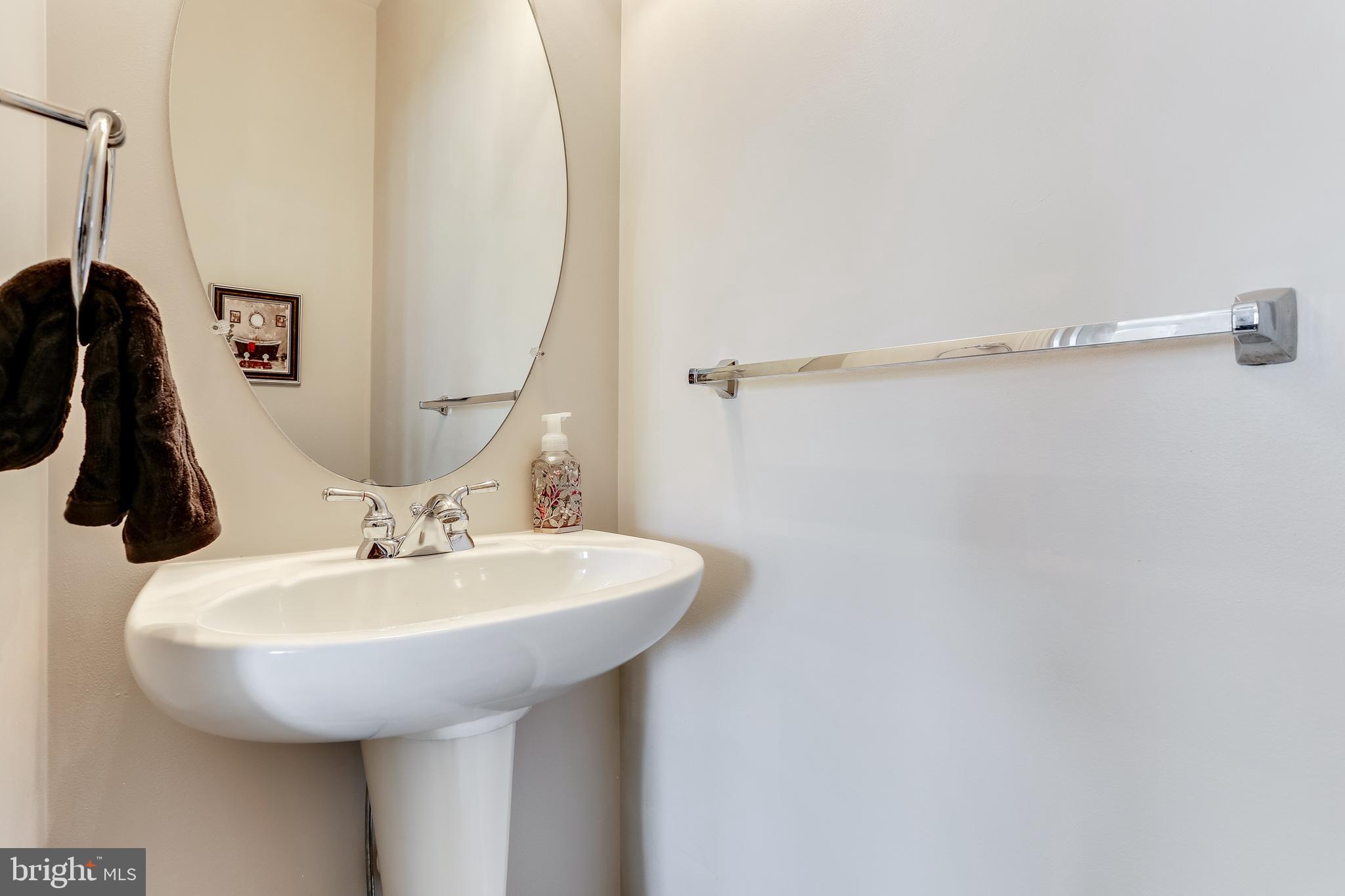 7128 Water Oak Road, Unit 244 Elkridge, MD 21075 - Photo 7 of 31 Powder room off living room for convenience