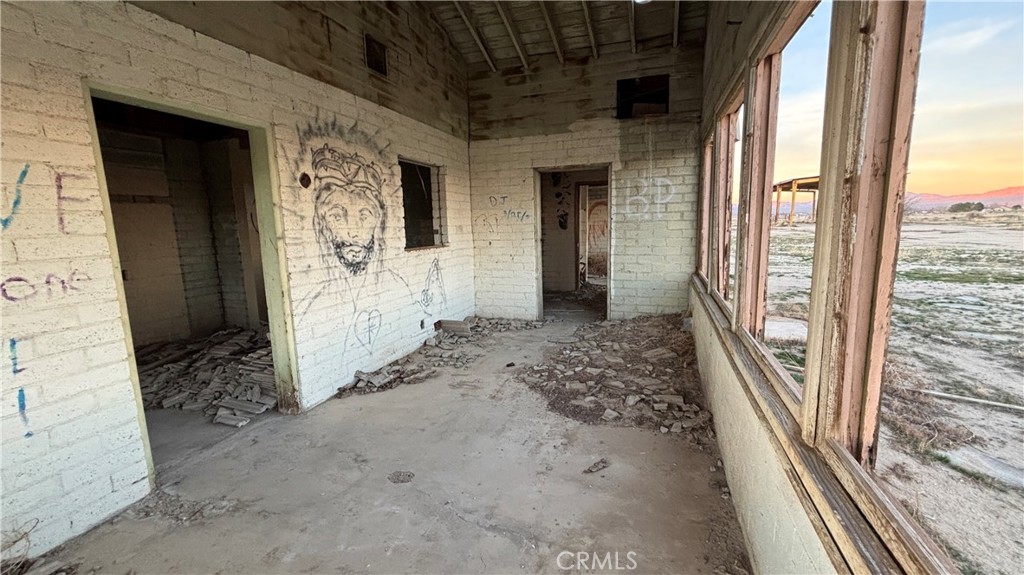 12148 Wilshire Road Lucerne Valley, CA 92356 - Photo 14 of 29 a view of a entryway door of the house