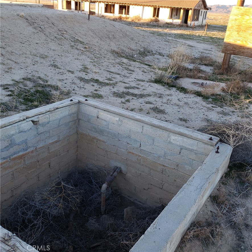 12148 Wilshire Road Lucerne Valley, CA 92356 - Photo 23 of 29 a view of a dry yard