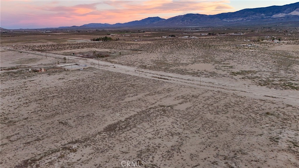 12148 Wilshire Road Lucerne Valley, CA 92356 - Photo 28 of 29 a view of an ocean with a mountain