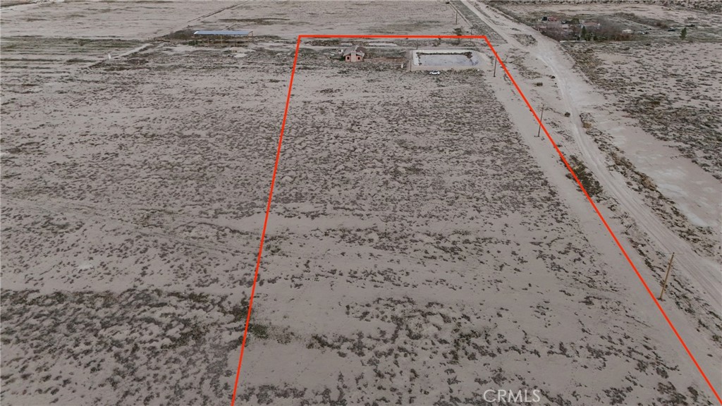 12148 Wilshire Road Lucerne Valley, CA 92356 - Photo 5 of 29 a view of a dry yard