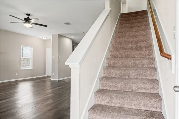 a view of cabinets and window