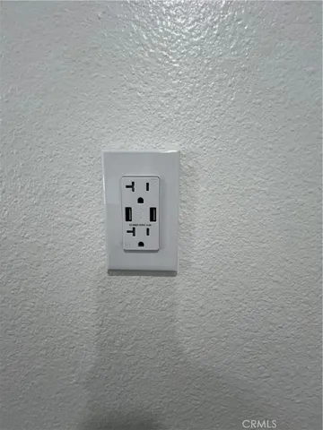 a kitchen with a sink cabinets and a stove