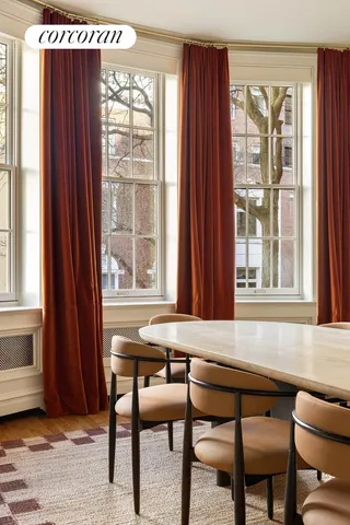 a workspace with furniture and a window