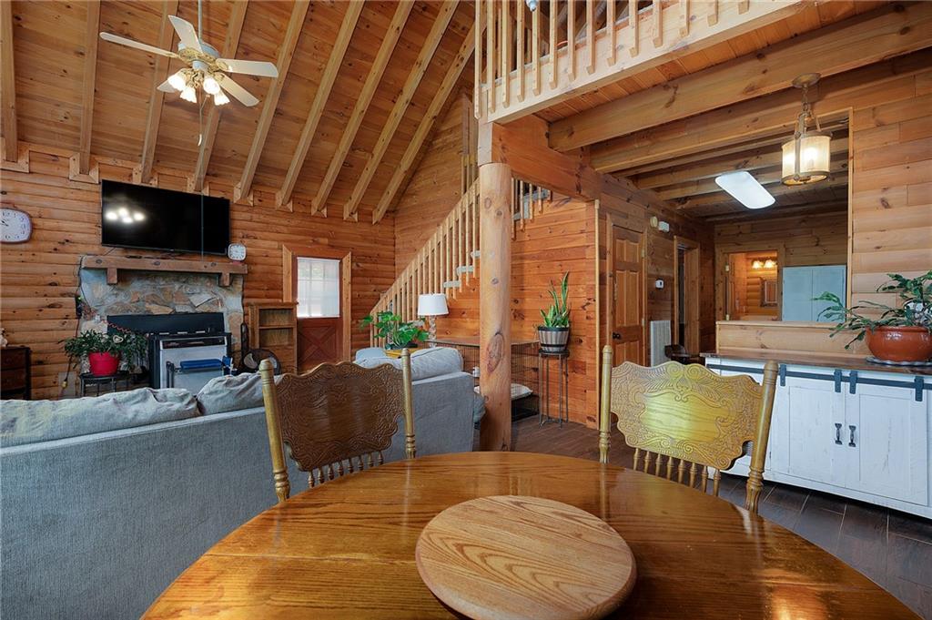 1001 Liberty Church Road Northeast Ranger, GA 30734 - Photo 21 of 40 a living room with furniture a flat screen tv and a fireplace