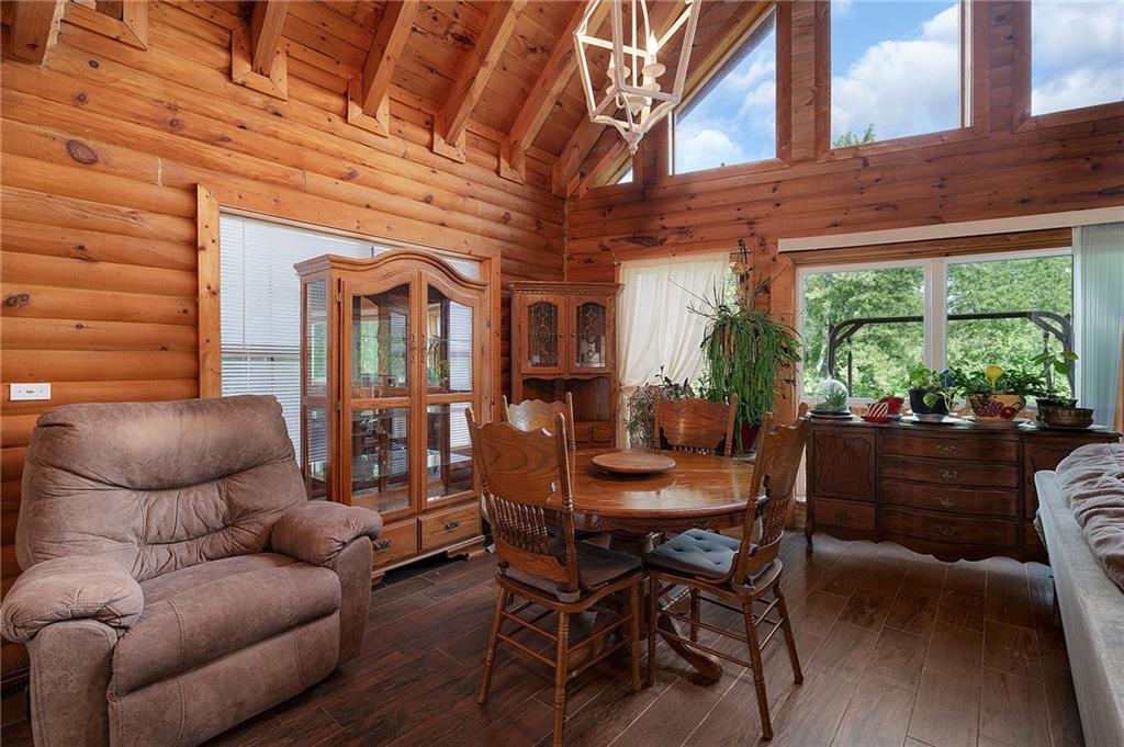 1001 Liberty Church Road Northeast Ranger, GA 30734 - Photo 22 of 40 a dining room with furniture and a potted plant
