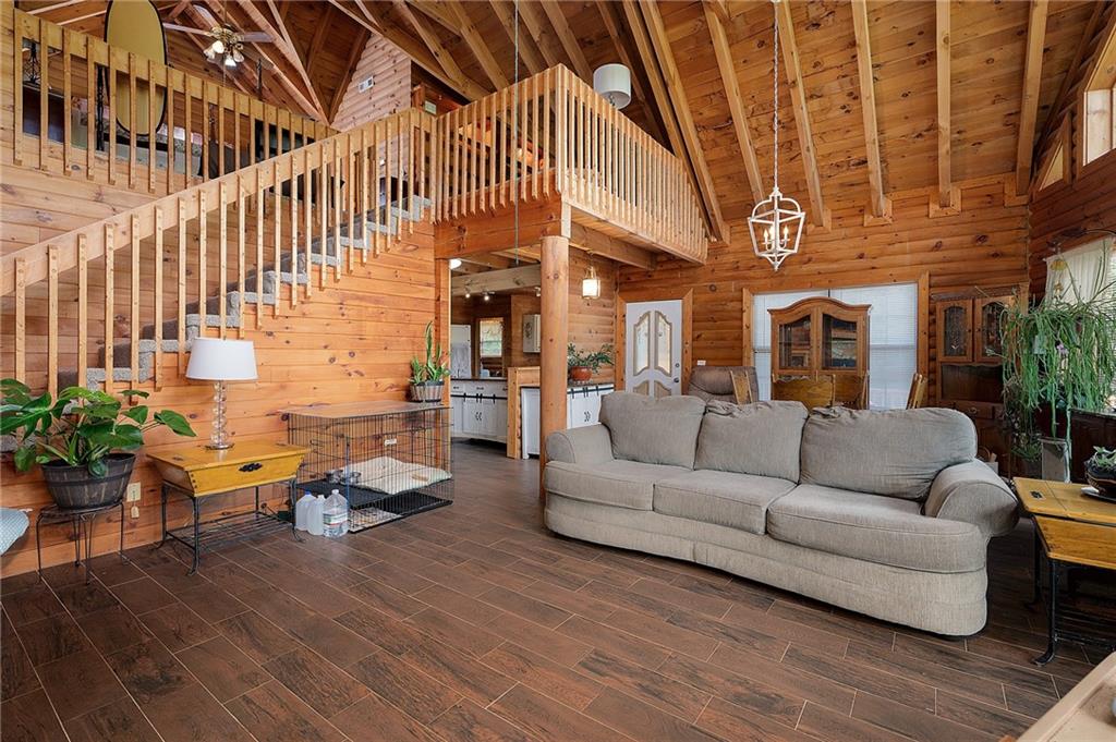 1001 Liberty Church Road Northeast Ranger, GA 30734 - Photo 24 of 40 a living room with furniture and wooden floor