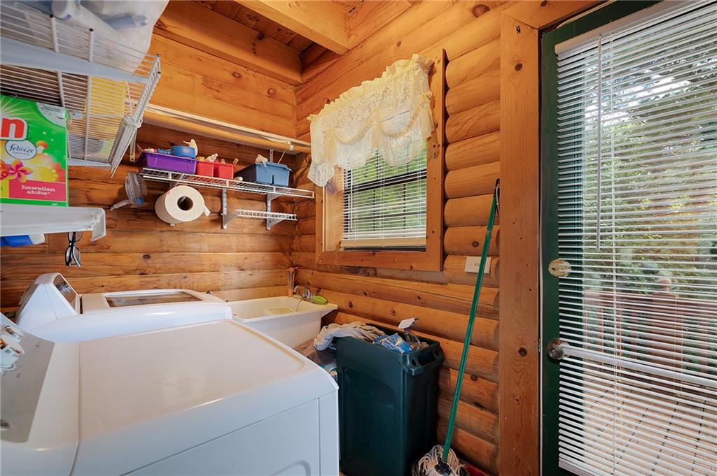 1001 Liberty Church Road Northeast Ranger, GA 30734 - Photo 27 of 40 a utility room with dryer and washer