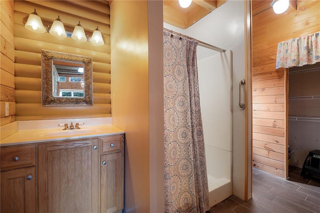 1001 Liberty Church Road Northeast Ranger, GA 30734 - Photo 28 of 40 a bathroom with a sink and a mirror