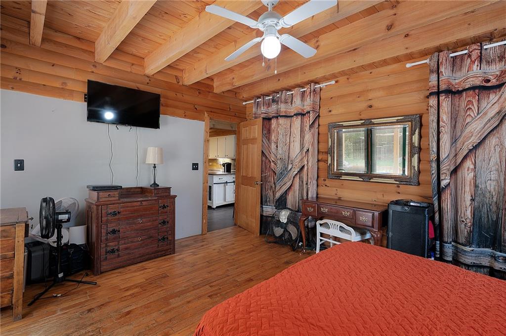 1001 Liberty Church Road Northeast Ranger, GA 30734 - Photo 30 of 40 a bed room with a bed and a television