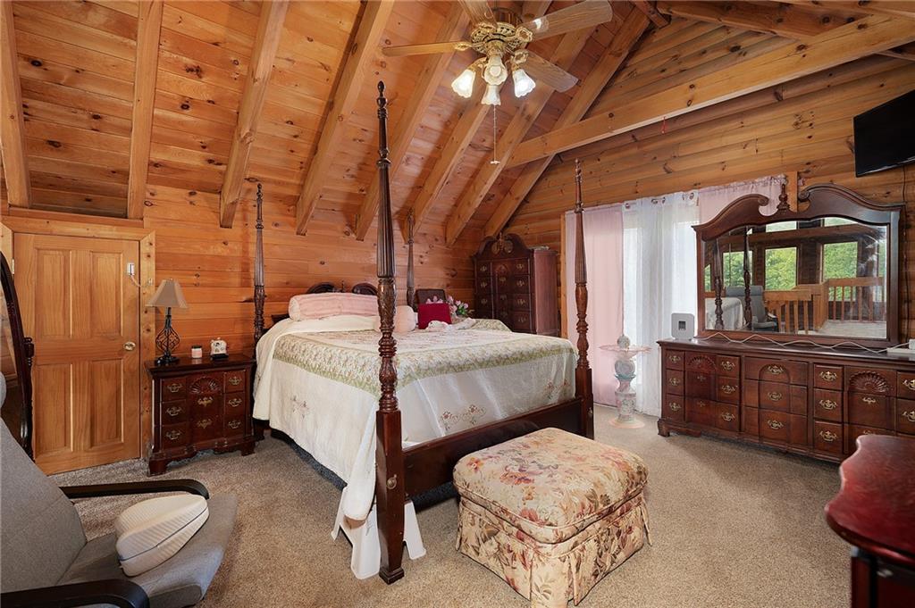 1001 Liberty Church Road Northeast Ranger, GA 30734 - Photo 33 of 40 a bedroom with a bed and a dresser