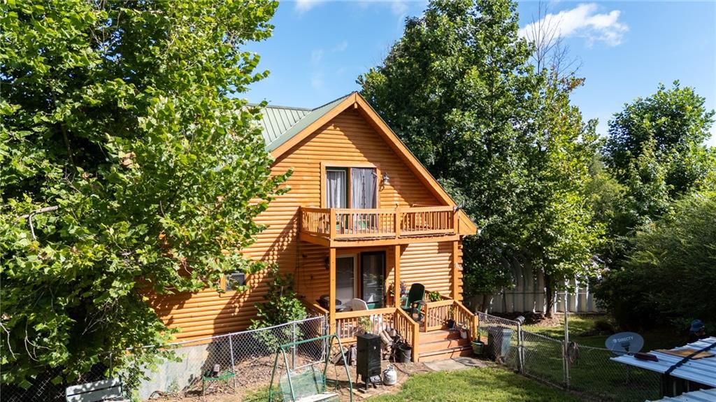 1001 Liberty Church Road Northeast Ranger, GA 30734 - Photo 4 of 40 a view of a house with backyard and trees