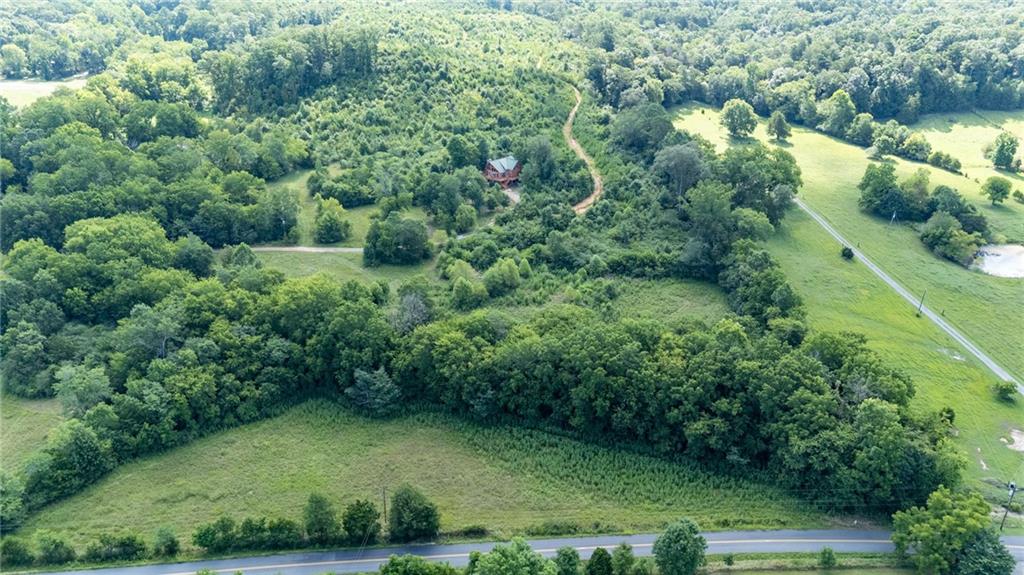 1001 Liberty Church Road Northeast Ranger, GA 30734 - Photo 8 of 40 an aerial view of residential houses with outdoor space and trees