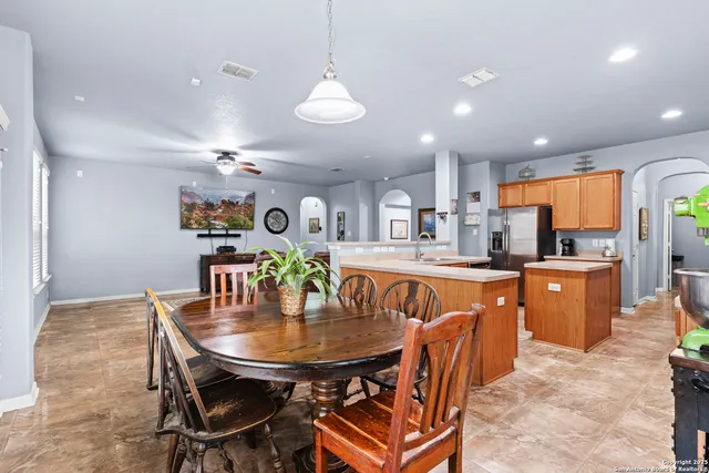 a view of a dining room with furniture
