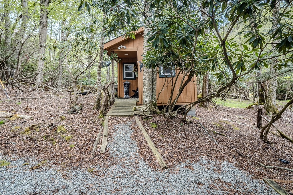 107-109 Shagbark Road Beech Mountain, NC 28604 - Photo 44 of 45 a view of a house with a yard