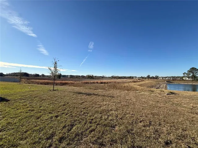 a kitchen with a refrigerator and a microwave