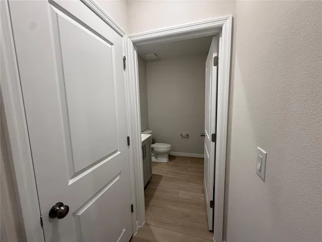 a bathroom with a sink and toilet