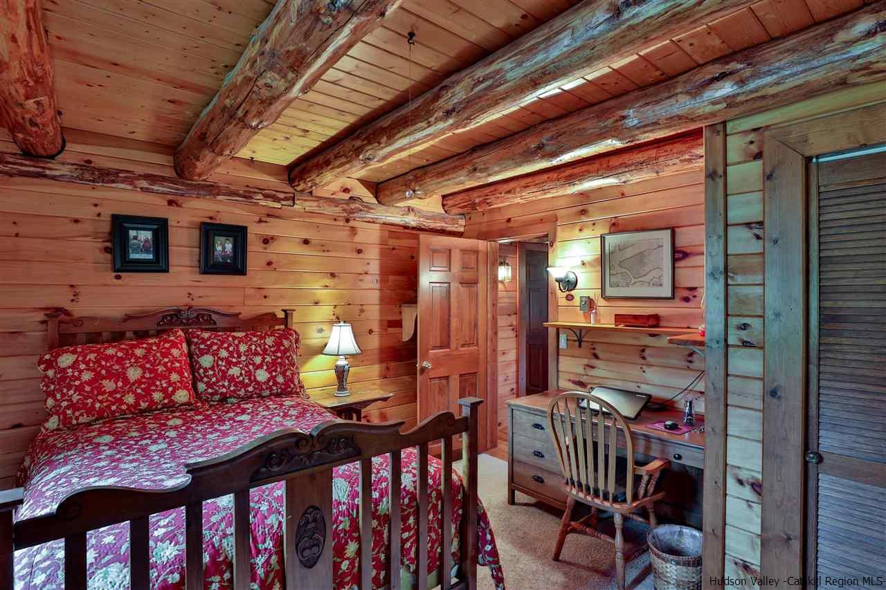 391 Tumbleweed Ranch Road West Kill, NY 12492 - Photo 19 of 35 a view of a porch with furniture