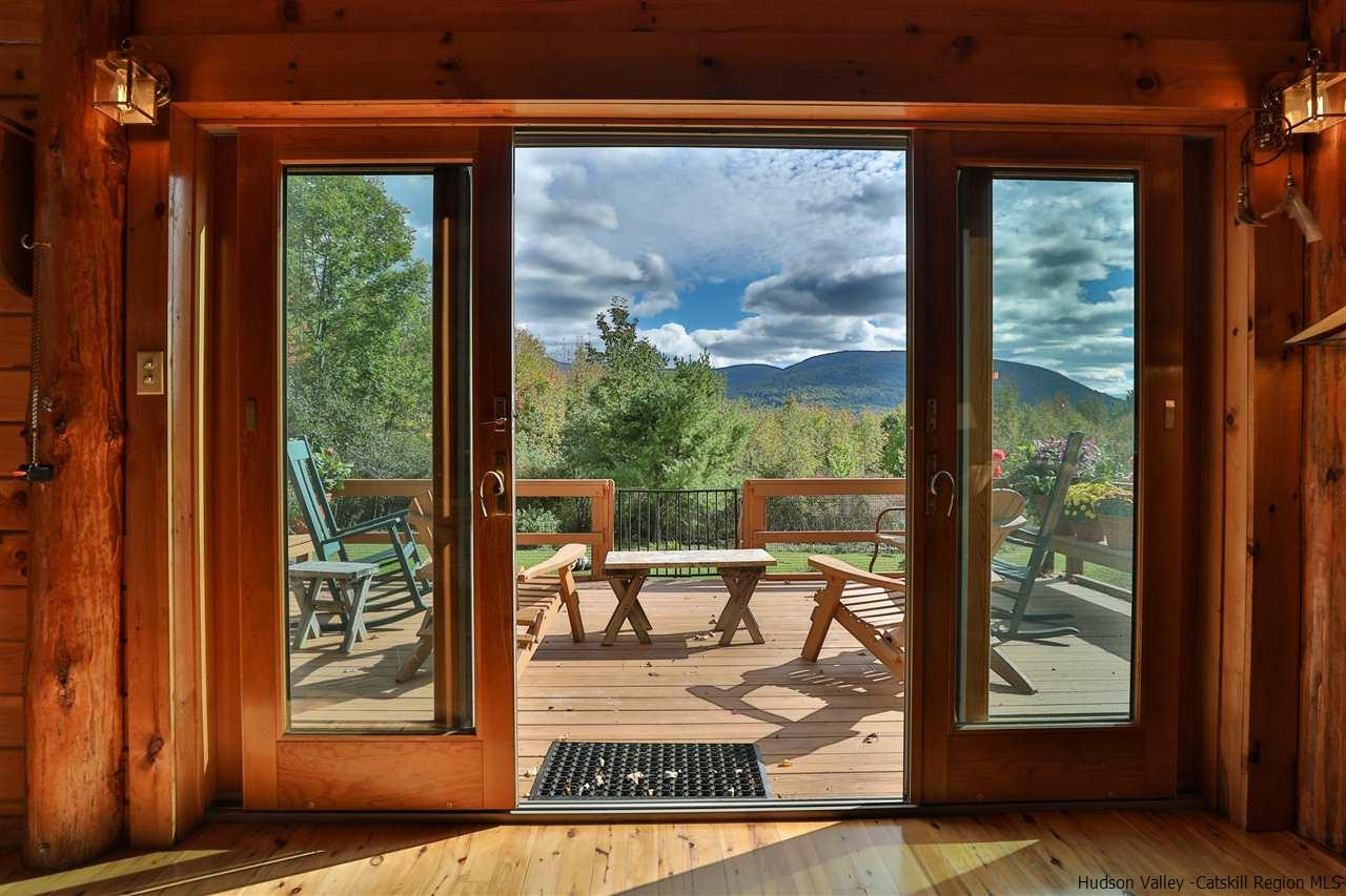 391 Tumbleweed Ranch Road West Kill, NY 12492 - Photo 26 of 35 a view of a door and chair in the balcony