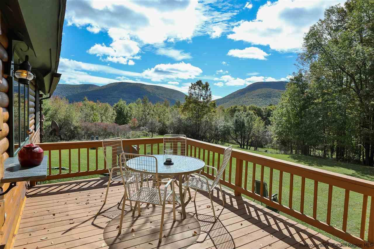 391 Tumbleweed Ranch Road West Kill, NY 12492 - Photo 3 of 35 a view of a chairs and table in the balcony
