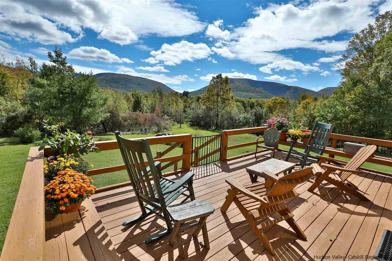 391 Tumbleweed Ranch Road West Kill, NY 12492 - Photo 4 of 35 a view of a chairs and table on the terrace