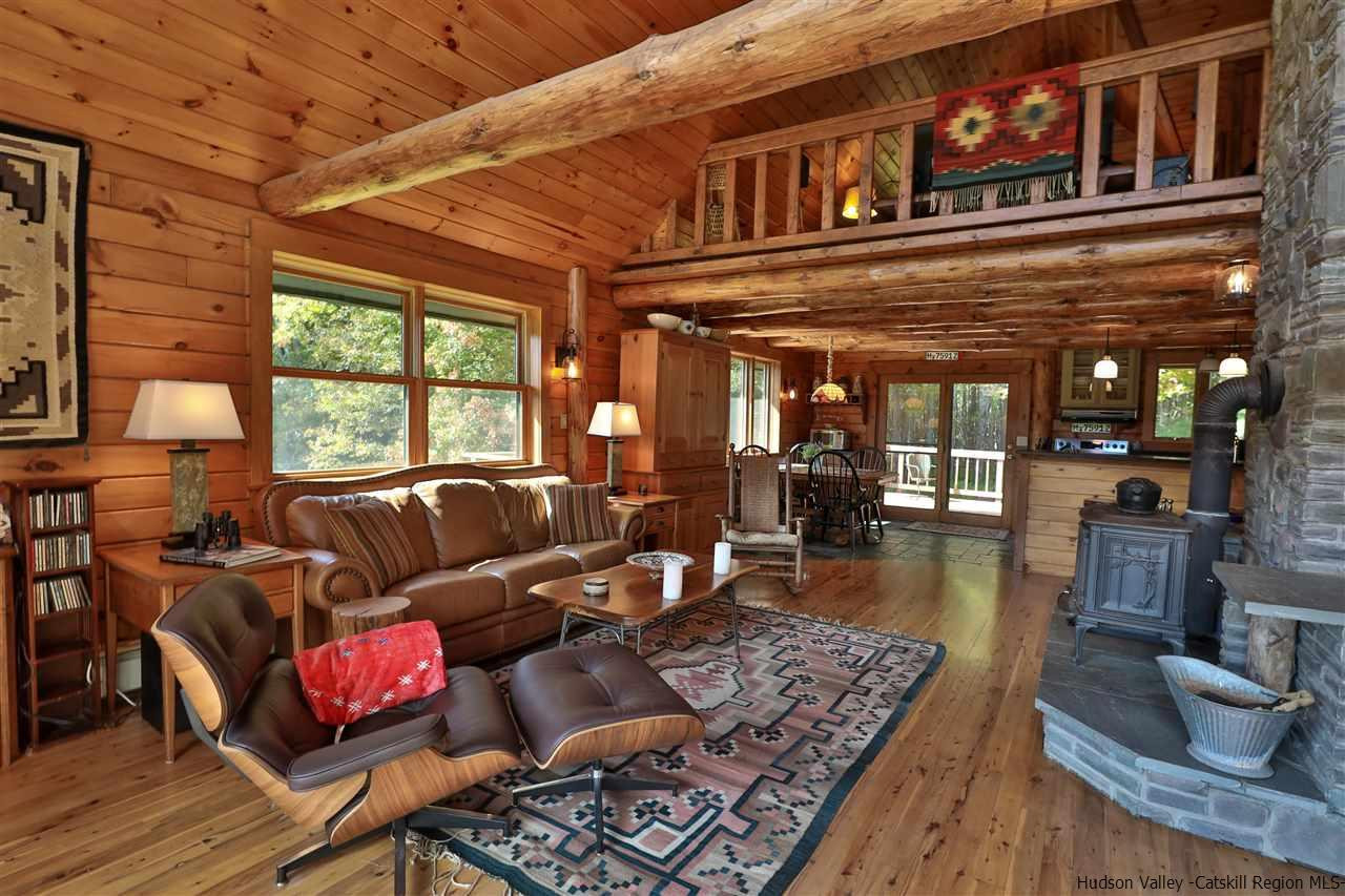 391 Tumbleweed Ranch Road West Kill, NY 12492 - Photo 6 of 35 a living room with furniture and a large window