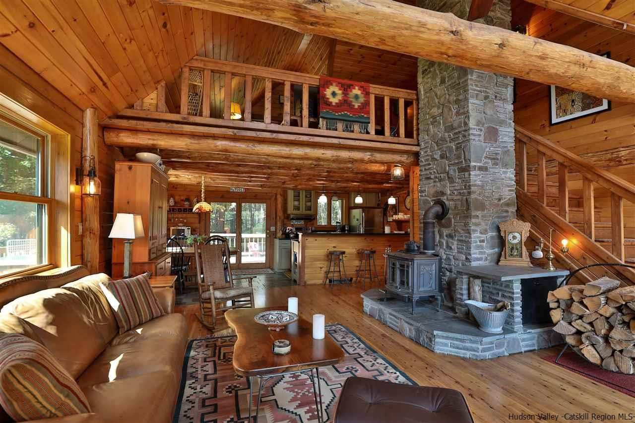 391 Tumbleweed Ranch Road West Kill, NY 12492 - Photo 7 of 35 a view of a chairs and a table in the patio
