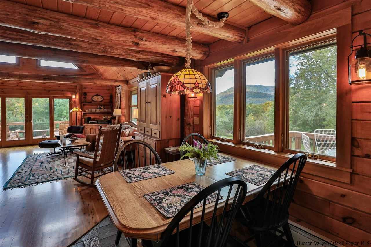 391 Tumbleweed Ranch Road West Kill, NY 12492 - Photo 9 of 35 a view of a dining room with furniture window and outside view