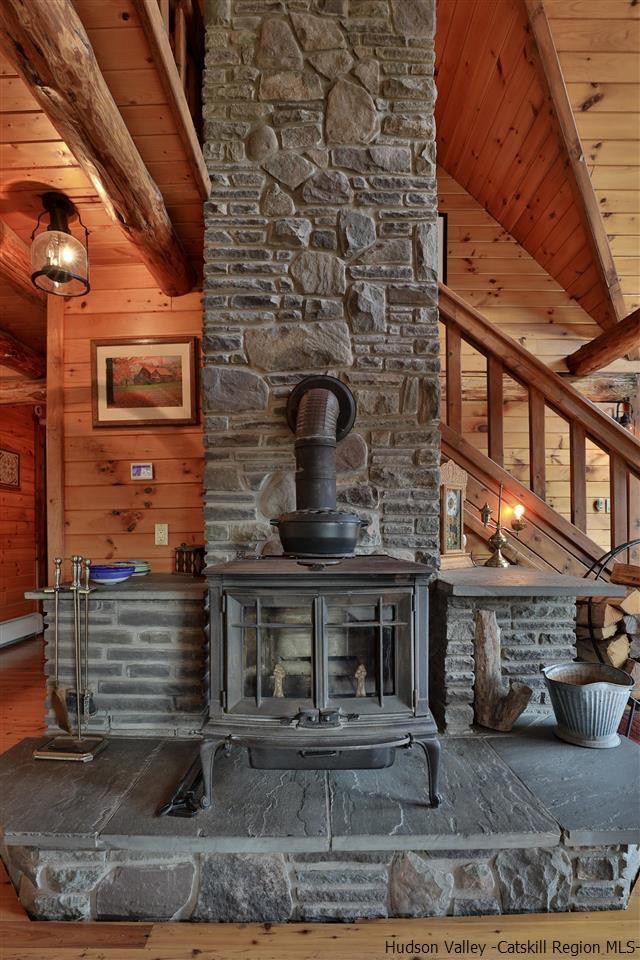 391 Tumbleweed Ranch Road West Kill, NY 12492 - Photo 10 of 35 a front view of a building with glass windows