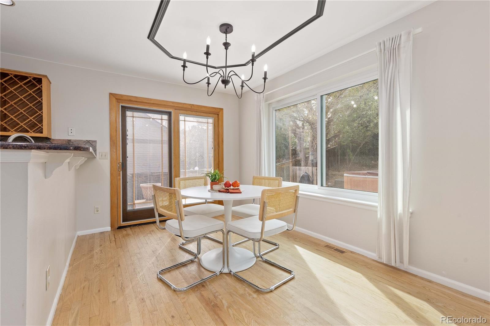 758 Huntington Place Highlands Ranch, CO 80126 - Photo 11 of 46 a living room with furniture a window and ceiling fan