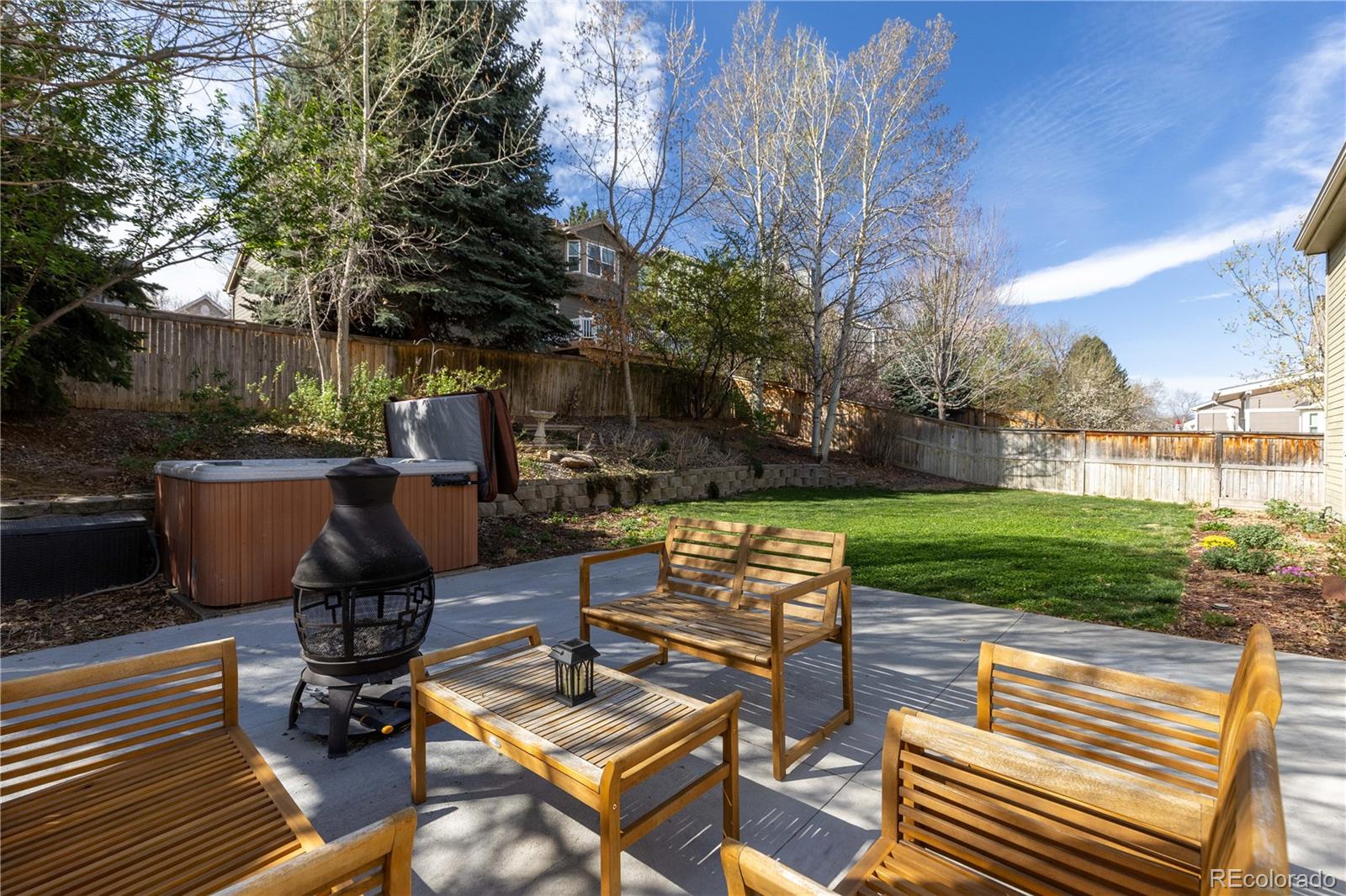 758 Huntington Place Highlands Ranch, CO 80126 - Photo 38 of 46 a view of a backyard with sitting area