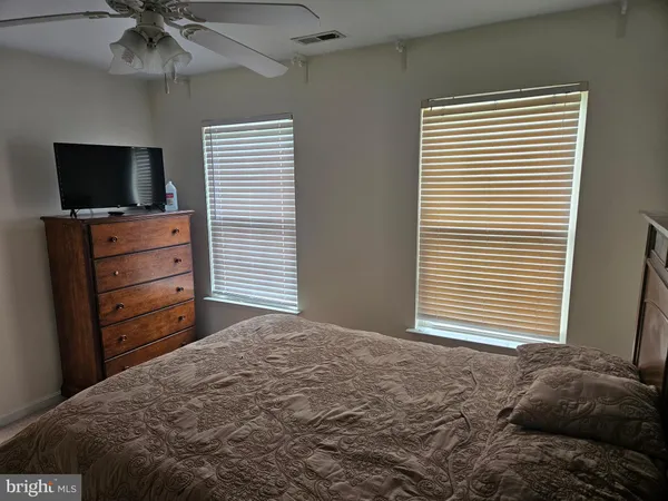 a bathroom with a sink double vanity and a mirror