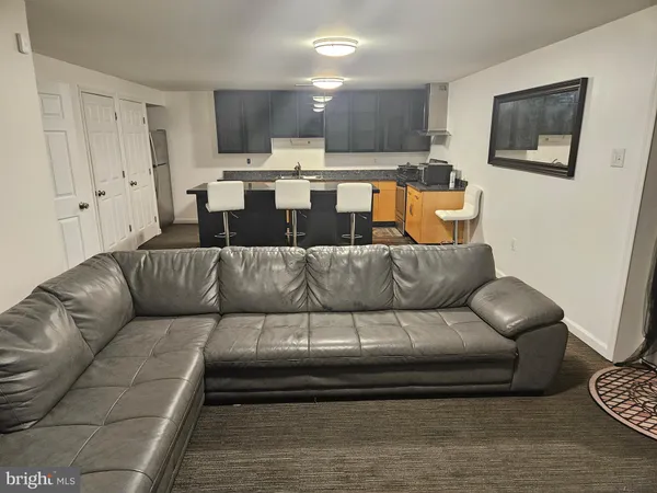 a bedroom with a bed and a table in it