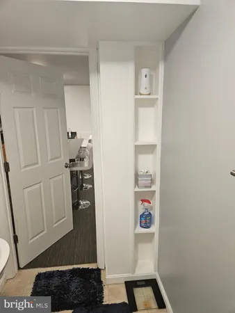 a view of backyard with deck and wooden floor