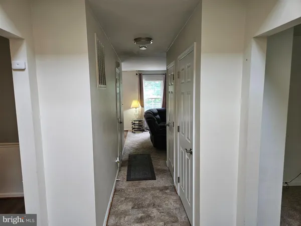 a kitchen with sink refrigerator and stove