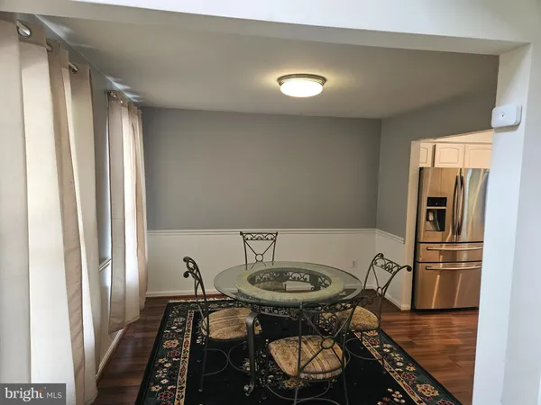 a kitchen with a stove and a microwave