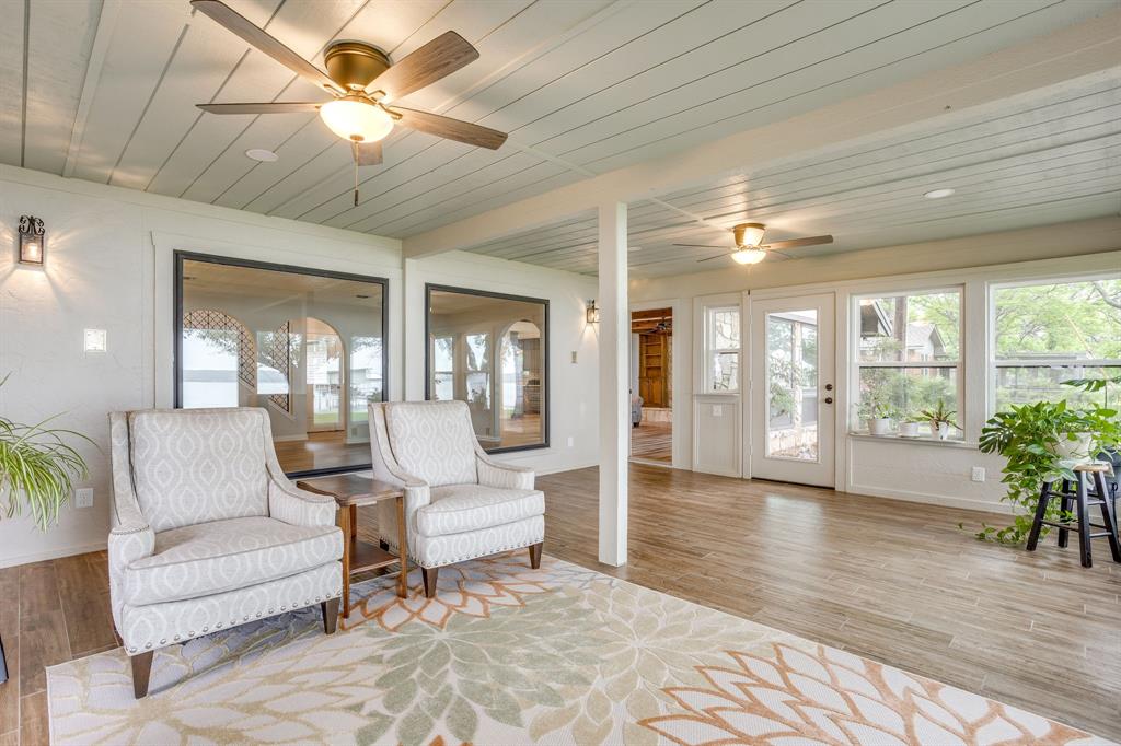 10814 Power Squadron Road Azle, TX 76020 - Photo 13 of 34 a living room with furniture and a large window with wooden floor