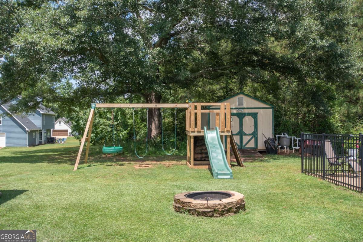 737 John Lovelace Road LaGrange, GA 30241 - Photo 29 of 46 a view of a backyard with a slide