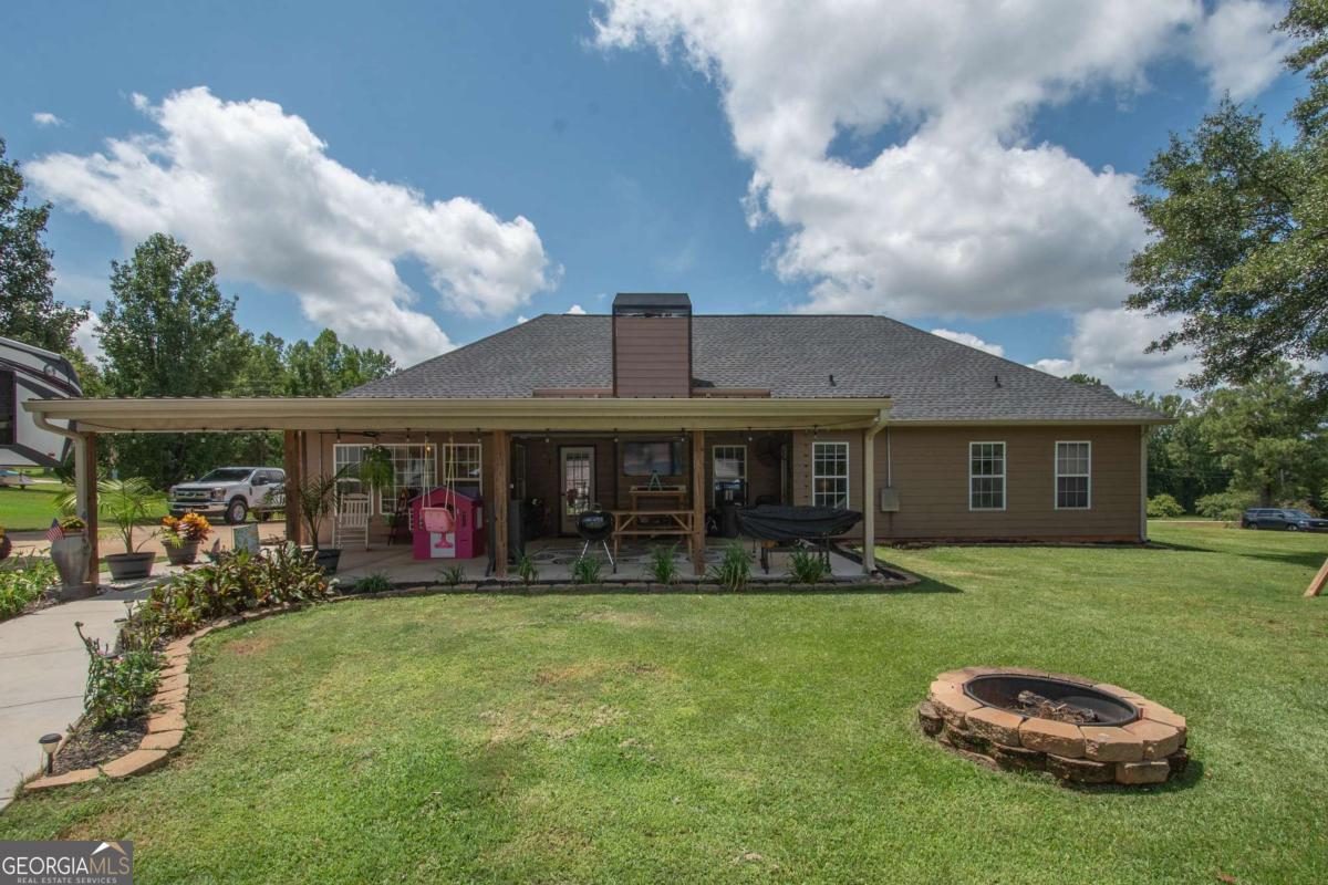 737 John Lovelace Road LaGrange, GA 30241 - Photo 33 of 46 a front view of a house with garden