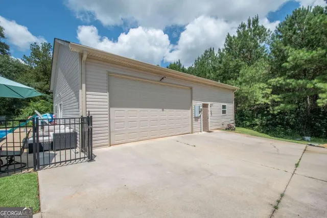 a front view of a house with a garage