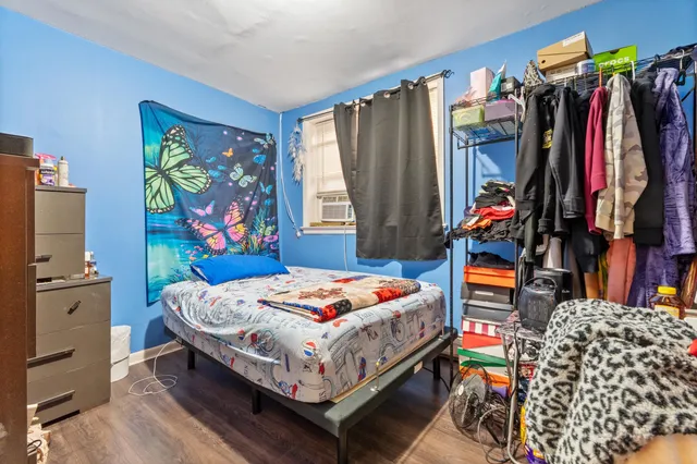 a room with lots of different colored cloths