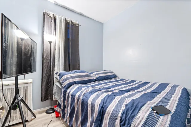 a kitchen with a sink cabinets and appliances