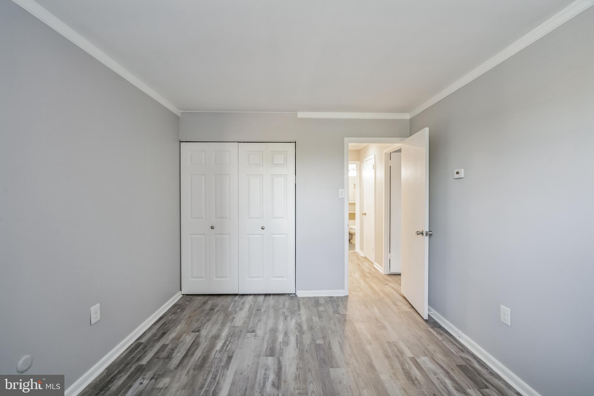 6100 Henry Avenue, Unit 4I Philadelphia, PA 19128 - Photo 20 of 30 a view of hallway with wooden floor