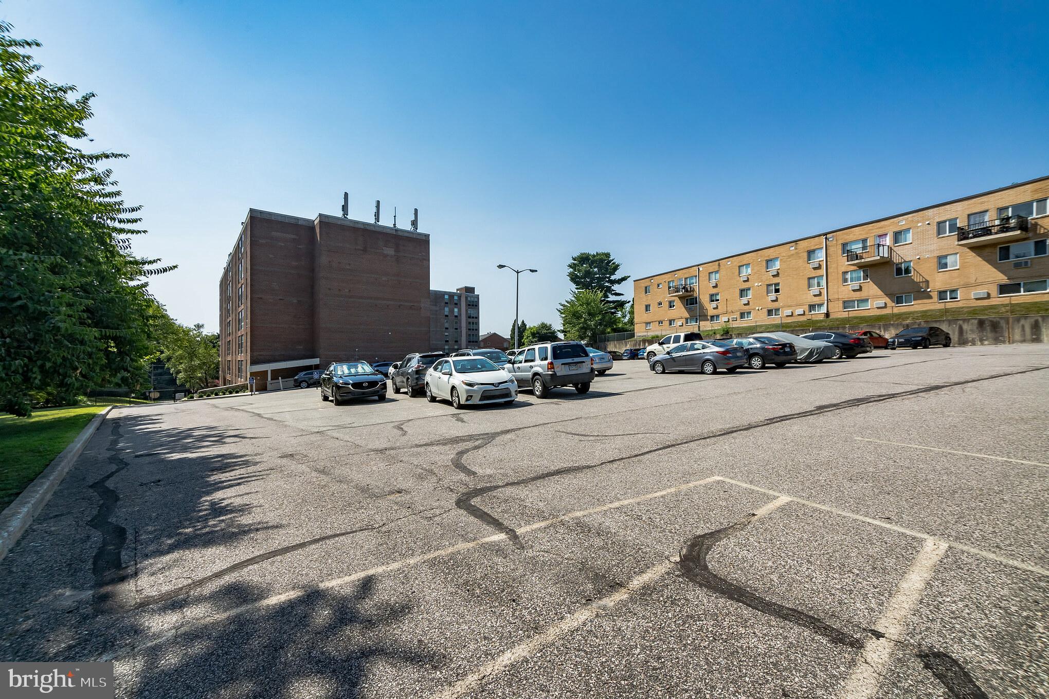 6100 Henry Avenue, Unit 4I Philadelphia, PA 19128 - Photo 29 of 30 a street view with tall buildings
