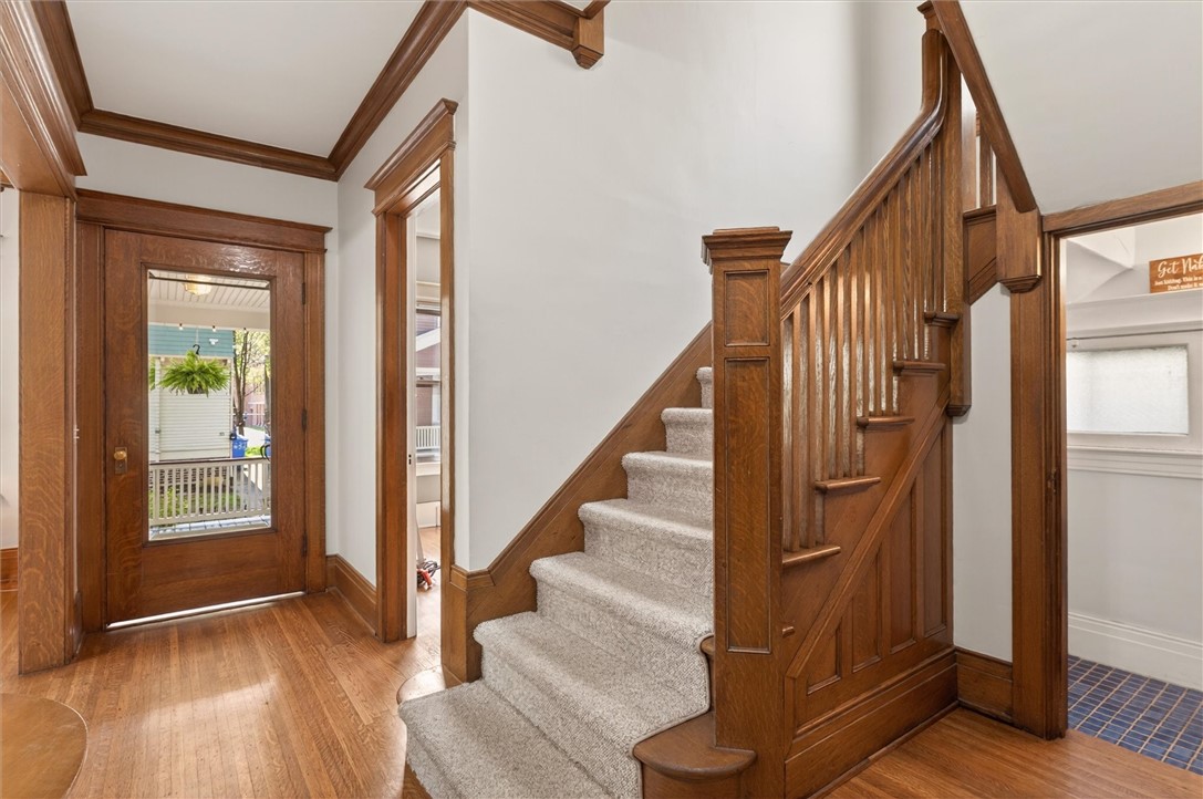 34 Erion Crescent Rochester, NY 14607 - Photo 22 of 49 stairs to second floor and first floor half bath t