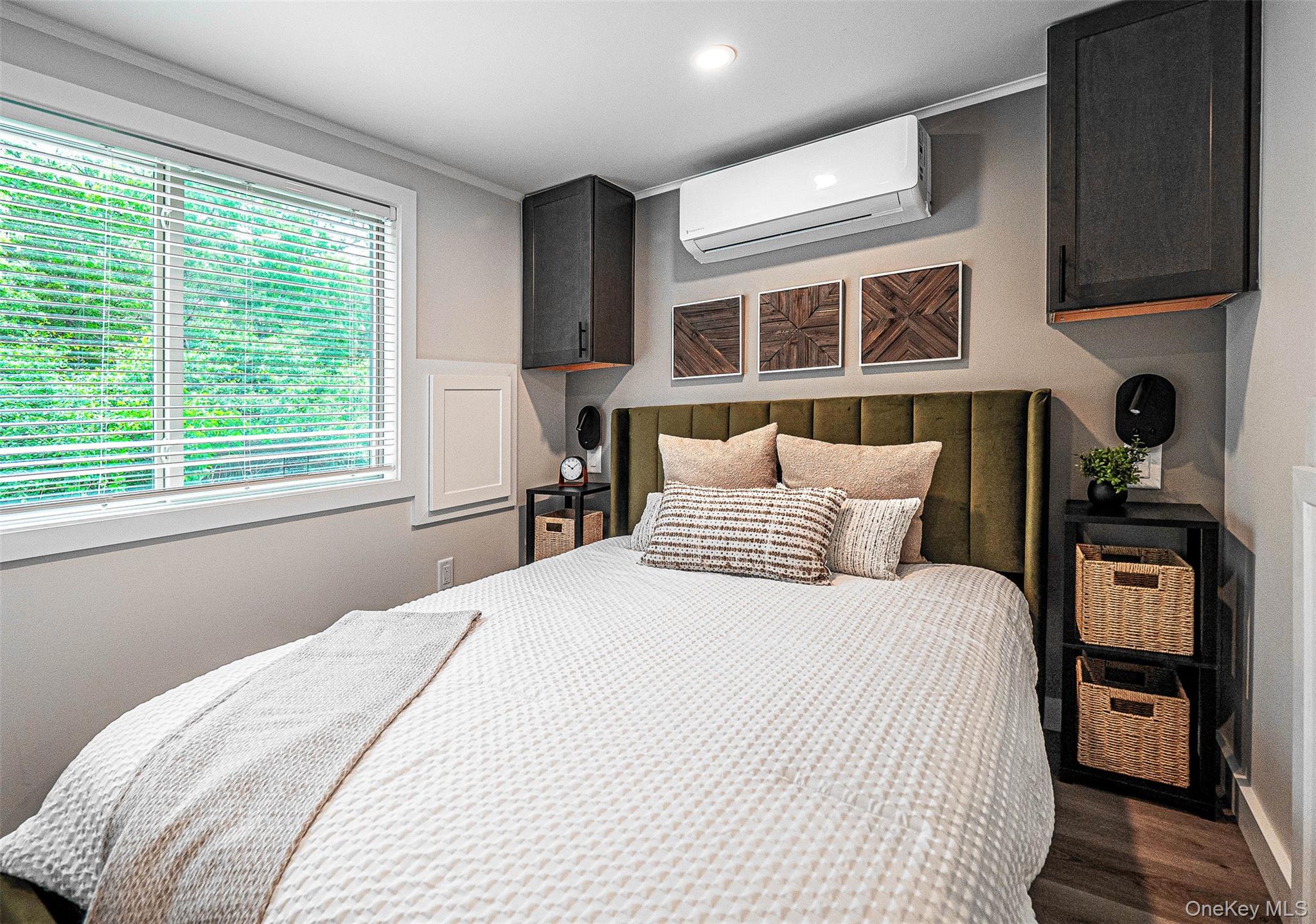 197 Wheeler Road, Unit 91 Florida, NY 10921 - Photo 11 of 48 Bedroom with a wall mounted AC, dark wood-style floors, crown molding, and recessed lighting